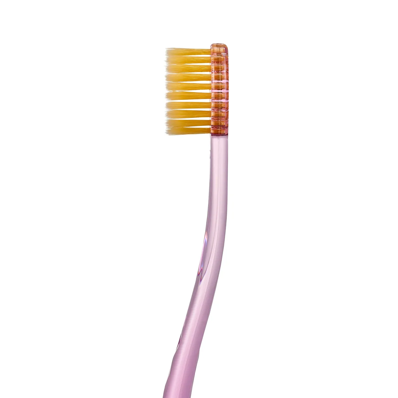 Toothbrush with 99.9% gold powder bristles